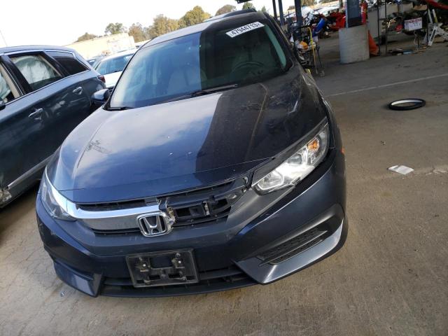 Photo 5 from auction – 2018 HONDA CIVIC EX with VIN 19XFC2F77JE205387