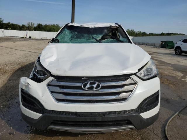 Photo 5 from auction – 2014 HYUNDAI SANTA FE S with VIN 5XYZT3LB9EG166340