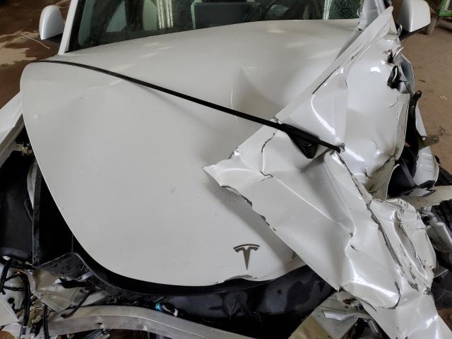 Photo 11 from auction – 2021 TESLA MODEL Y with VIN 5YJYGAED4MF210771