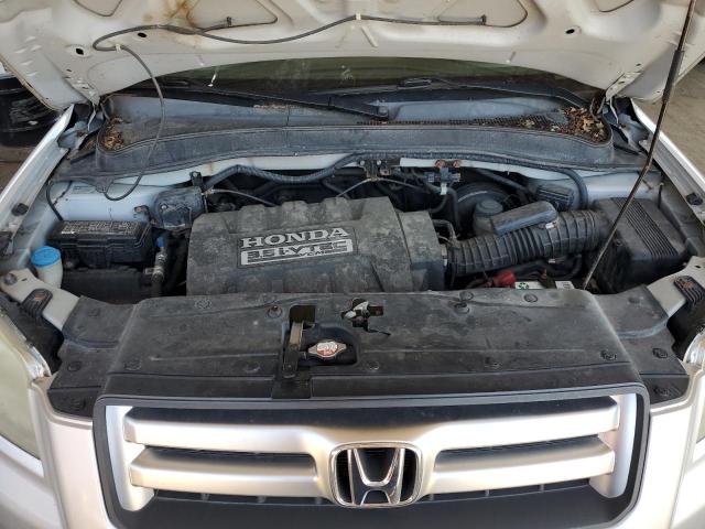 Photo 12 from auction – 2006 HONDA PILOT EX with VIN 5FNYF28546B015933