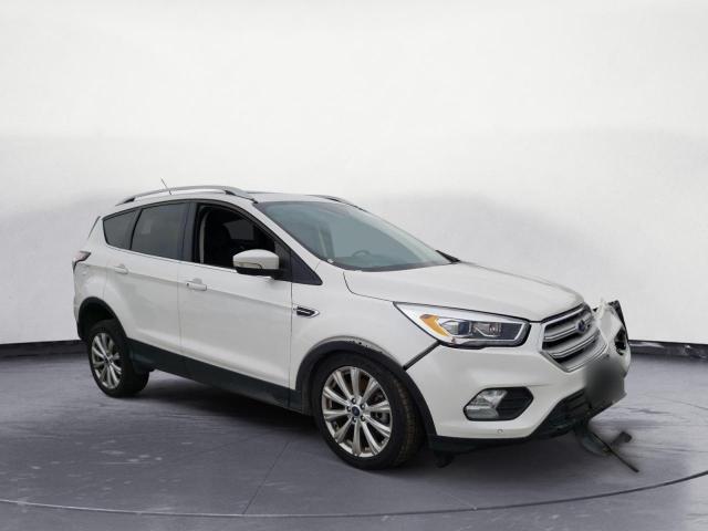 Photo 4 from auction – 2018 FORD ESCAPE TIT with VIN 1FMCU0J90JUD51270