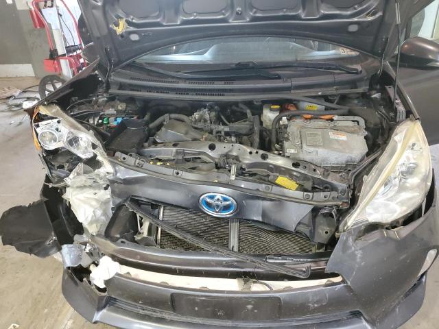 Photo 11 from auction – 2014 TOYOTA PRIUS C with VIN JTDKDTB31E1063986