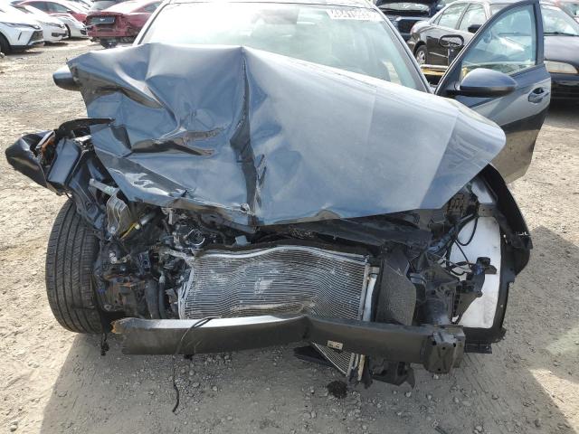 Photo 11 from auction – 2023 KIA FORTE LX with VIN 3KPF24AD9PE569489