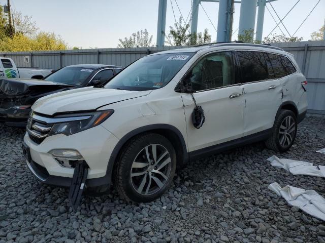 HONDA PILOT TOUR 2016 with VIN 5FNYF6H96GB029313 - Photo from auction