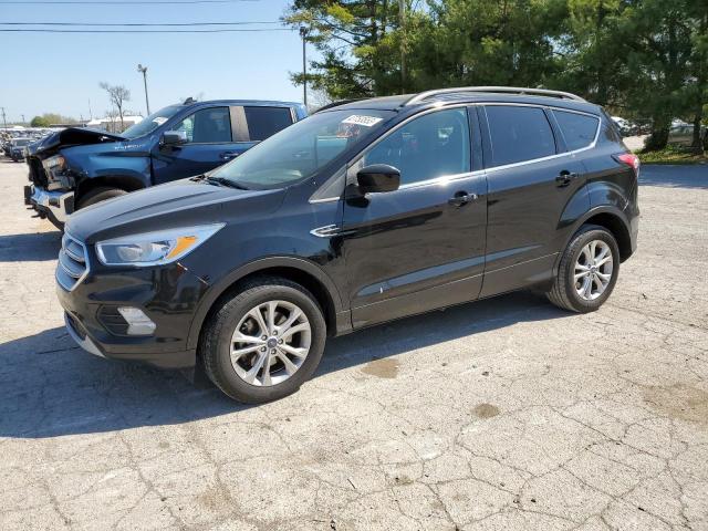 FORD ESCAPE SE 2018 with VIN 1FMCU9GD0JUB82335 - Photo from auction