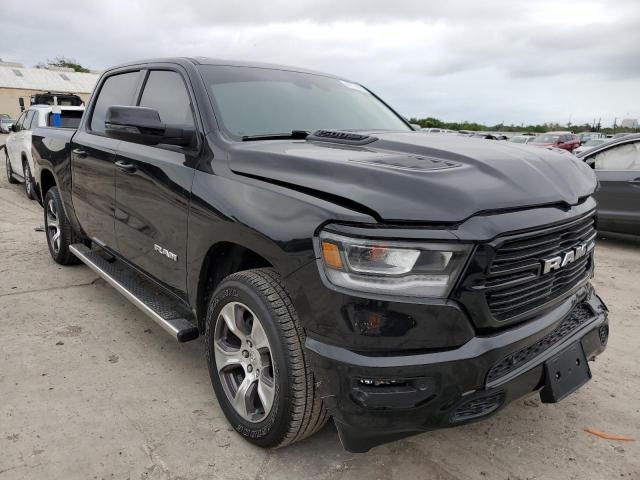 Photo 4 from auction – 2023 RAM 1500 LARAM with VIN 1C6SRFJT7PN520131