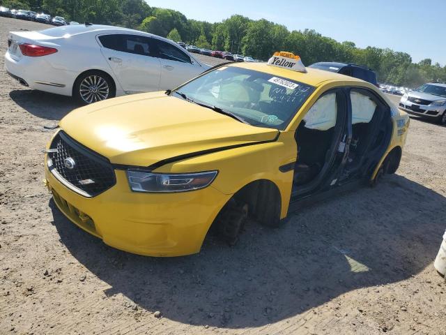 FORD TAURUS POL 2015 with VIN 1FAHP2MK1FG173568 - Photo from auction