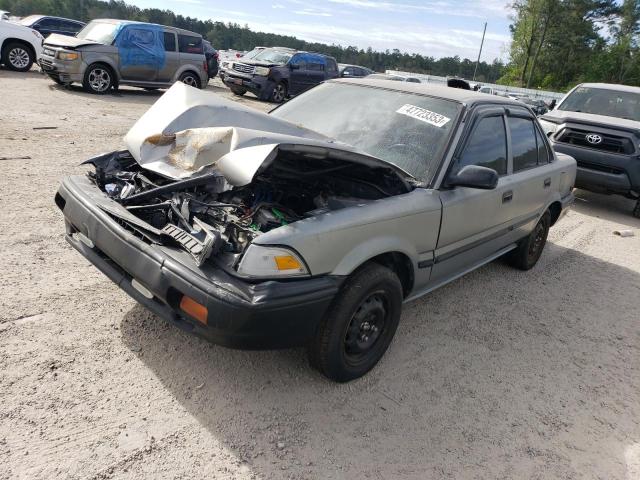 TOYOTA COROLLA DL 1990 with VIN 1NXAE94A2LZ117259 - Photo from auction