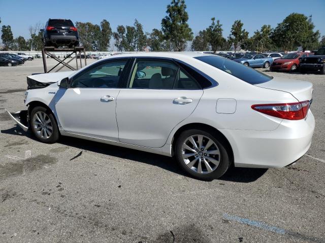 Photo 2 from auction – 2016 TOYOTA CAMRY HYBR with VIN 4T1BD1FK7GU196819