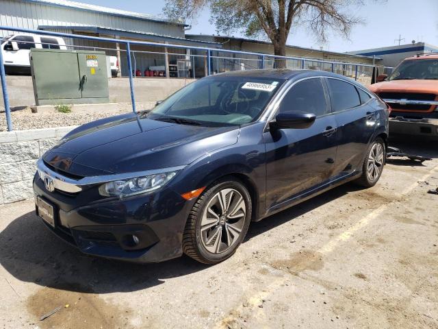 HONDA CIVIC EX 2018 with VIN JHMFC1F36JX003422 - Photo from auction