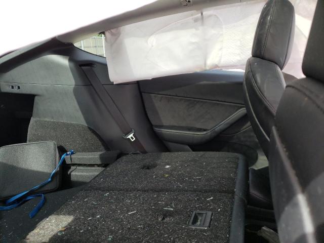 Photo 10 from auction – 2021 TESLA MODEL Y with VIN 5YJYGDED7MF106163