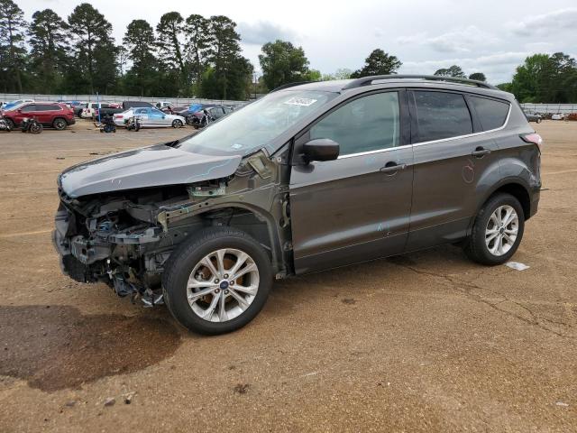 FORD ESCAPE SE 2018 with VIN 1FMCU0GDXJUA31241 - Photo from auction