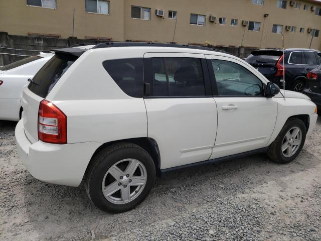 Photo 3 from auction – 2010 JEEP COMPASS SP with VIN 1J4NT4FB3AD633528