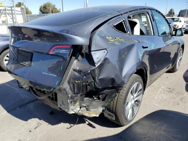 Photo 3 from auction – 2023 TESLA MODEL Y with VIN 7SAYGAEE8PF584235