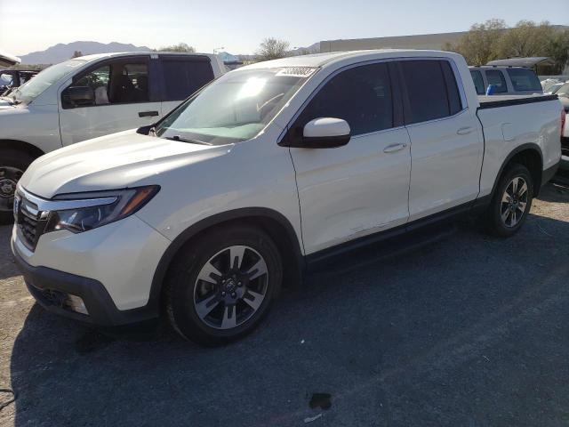 HONDA RIDGELINE 2019 with VIN 5FPYK2F59KB000280 - Photo from auction