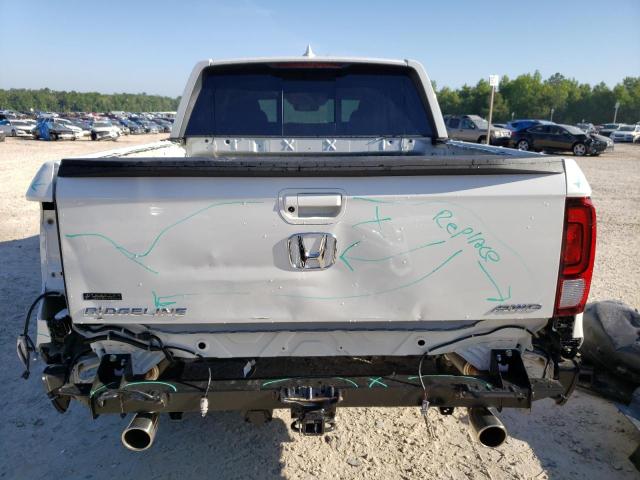 Photo 6 from auction – 2023 HONDA RIDGELINE with VIN 5FPYK3F51PB015420