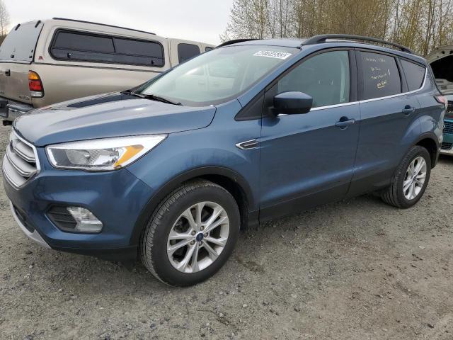 Photo 1 from auction – 2018 FORD ESCAPE SE with VIN 1FMCU9GD2JUB82854