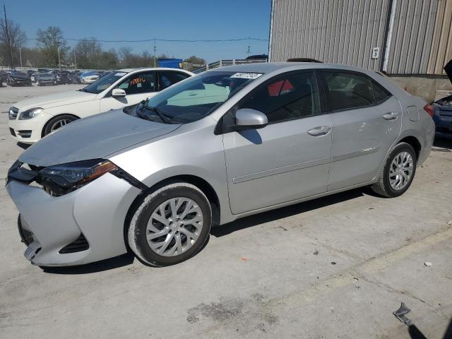 TOYOTA COROLLA LE 2018 with VIN 5YFBURHE3JP834885 - Photo from auction