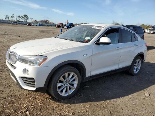 BMW X4 XDRIVE2 2015 with VIN 5UXXW3C59F0M87177 - Photo from auction