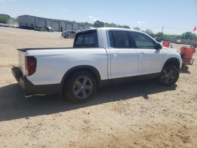 Photo 3 from auction – 2023 HONDA RIDGELINE with VIN 5FPYK3F58PB007511