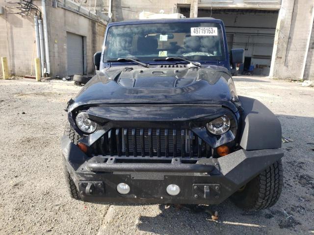 Photo 5 from auction – 2012 JEEP WRANGLER U with VIN 1C4BJWDG2CL290504