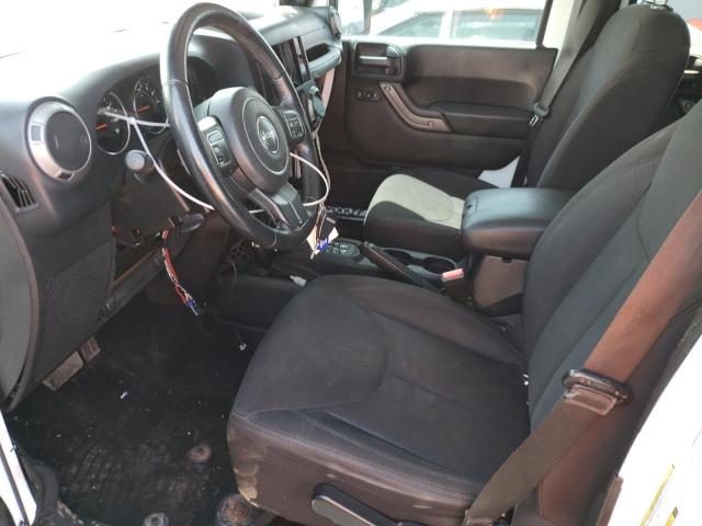 Photo 7 from auction – 2014 JEEP WRANGLER U with VIN 1C4BJWDG1EL150432