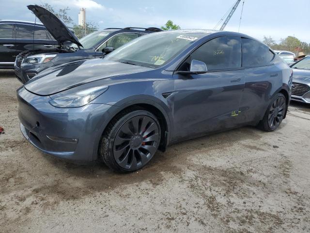 TESLA MODEL Y 2022 with VIN 7SAYGDEF3NF374147 - Photo from auction