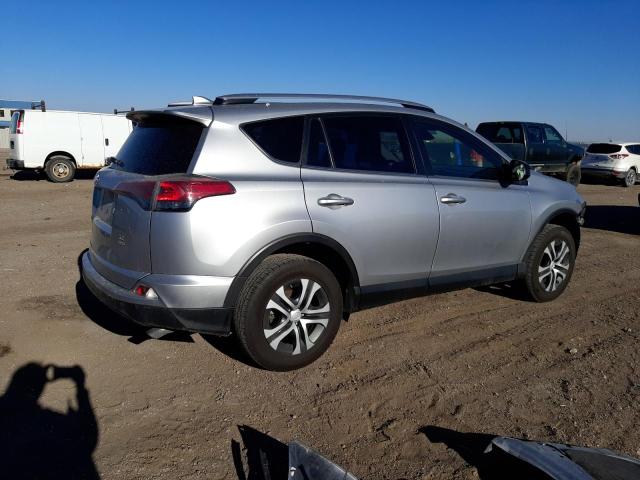 Photo 3 from auction – 2018 TOYOTA RAV4 LE with VIN JTMBFREV3JJ211589