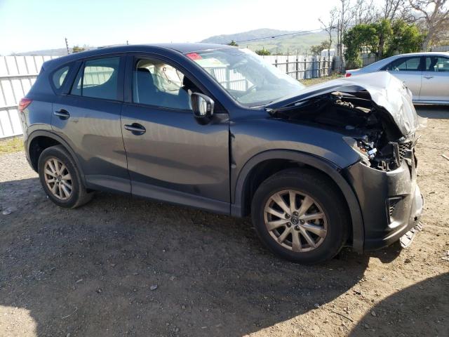 Photo 4 from auction – 2014 MAZDA CX-5 SPORT with VIN JM3KE2BE2E0427080