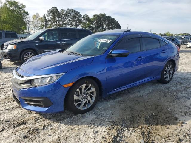 Photo 1 from auction – 2018 HONDA CIVIC EX with VIN 19XFC2F75JE023039