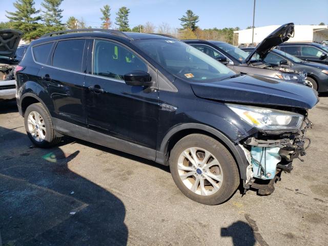 Photo 4 from auction – 2017 FORD ESCAPE SE with VIN 1FMCU9G92HUD68030