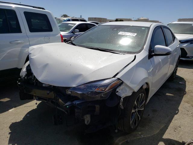 TOYOTA COROLLA L 2019 with VIN 5YFBURHEXKP864449 - Photo from auction