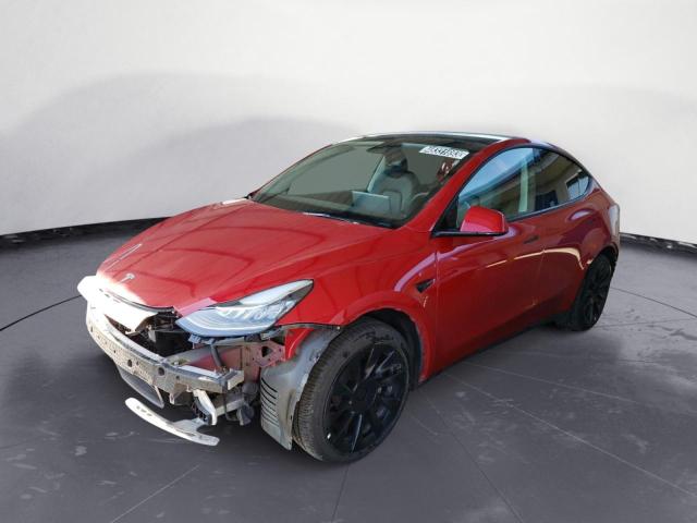 TESLA MODEL Y 2022 with VIN 7SAYGDEE2NF386717 - Photo from auction