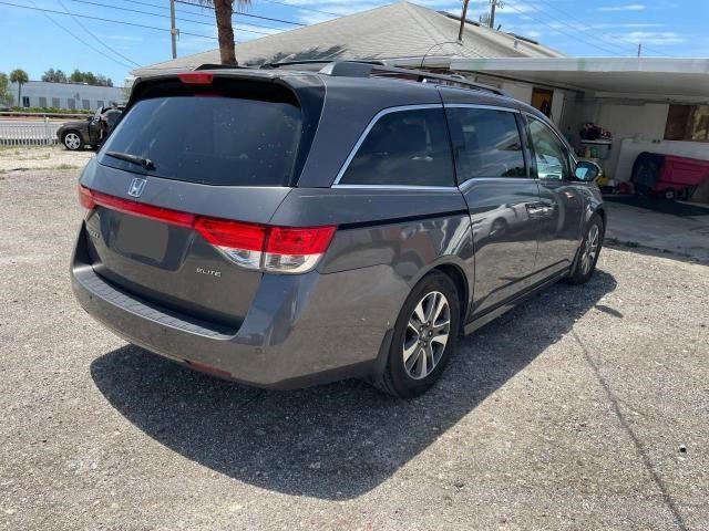 Photo 4 from auction – 2014 HONDA ODYSSEY TO with VIN 5FNRL5H96EB035178