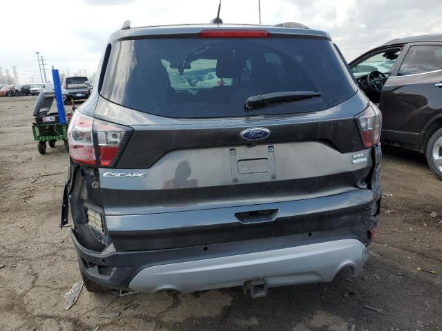 Photo 6 from auction – 2017 FORD ESCAPE SE with VIN 1FMCU9G99HUB11365