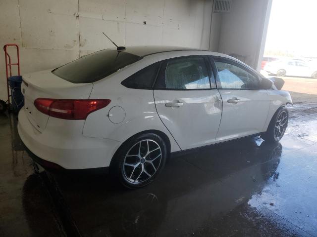 Photo 3 from auction – 2018 FORD FOCUS SE with VIN 1FADP3F29JL214756