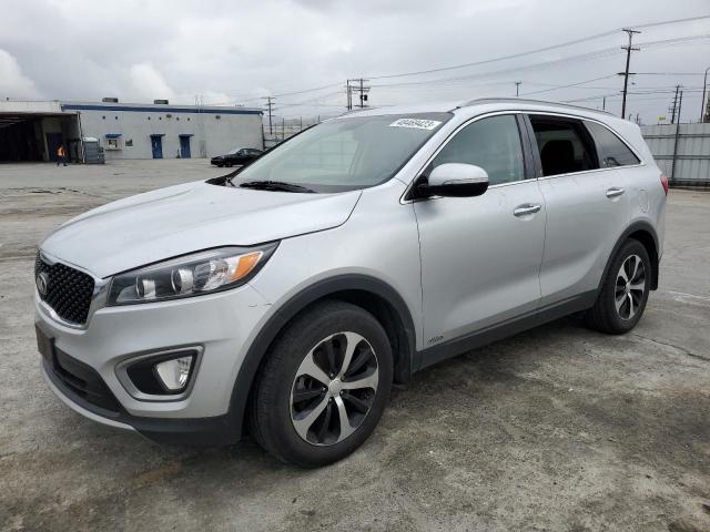 KIA SORENTO EX 2016 with VIN 5XYPHDA12GG029610 - Photo from auction
