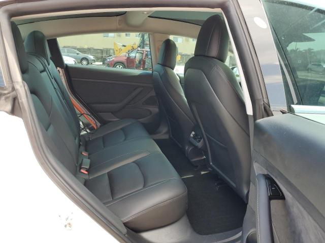 Photo 11 from auction – 2020 TESLA MODEL 3 with VIN 5YJ3E1EA4LF797008