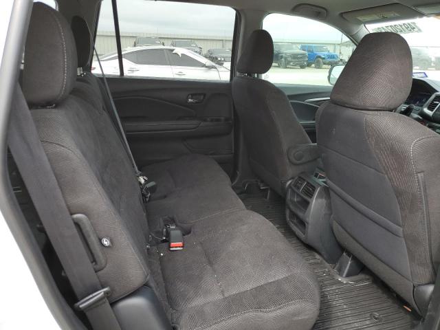 Photo 11 from auction – 2020 HONDA PILOT LX with VIN 5FNYF5H13LB025315