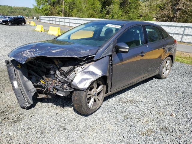 FORD FOCUS SE 2014 with VIN 1FADP3F24EL274644 - Photo from auction