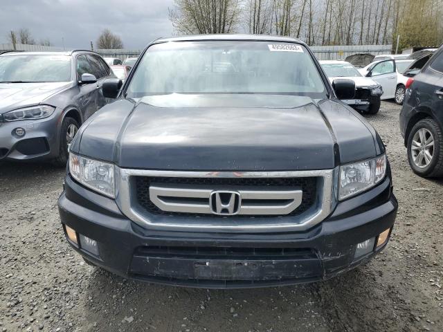 Photo 5 from auction – 2010 HONDA RIDGELINE with VIN 5FPYK1F58AB011585
