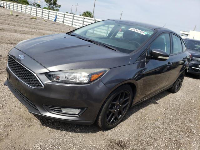 FORD FOCUS SE 2016 with VIN 1FADP3F24GL309072 - Photo from auction