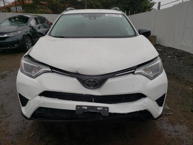 Photo 5 from auction – 2018 TOYOTA RAV4 LE with VIN JTMBFREV8JJ739919