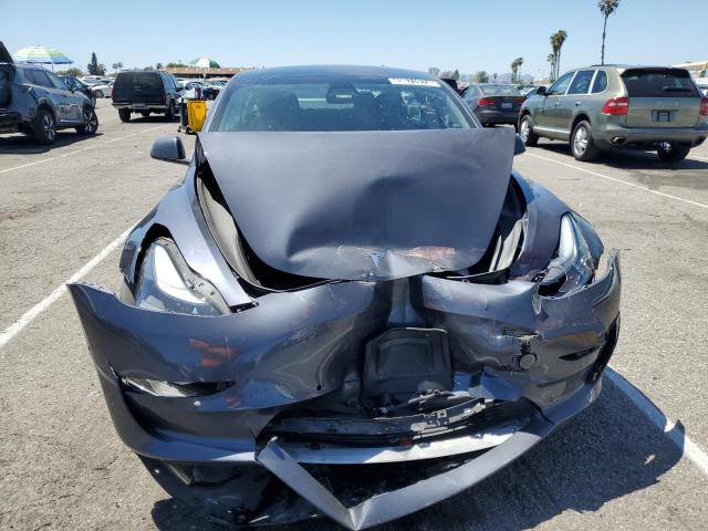 Photo 5 from auction – 2022 TESLA MODEL 3 with VIN 5YJ3E1EBXNF143562