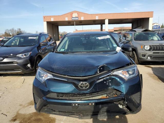 Photo 5 from auction – 2018 TOYOTA RAV4 LE with VIN 2T3BFREV2JW787420