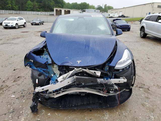 Photo 5 from auction – 2023 TESLA MODEL Y with VIN 7SAYGDEE1PA057958