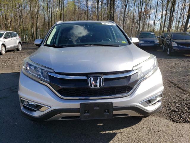 Photo 5 from auction – 2015 HONDA CR-V EXL with VIN 2HKRM4H77FH666241