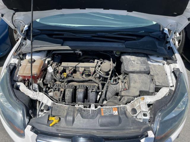 Photo 7 from auction – 2014 FORD FOCUS TITA with VIN 1FADP3J20EL321630