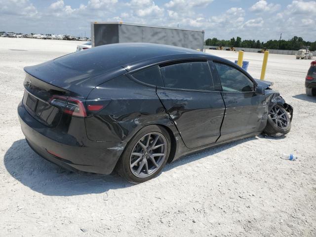Photo 3 from auction – 2021 TESLA MODEL 3 with VIN 5YJ3E1EAXMF920828