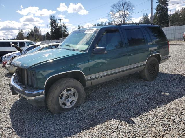 GMC YUKON 1999 with VIN 1GKEK13R5XJ712366 - Photo from auction